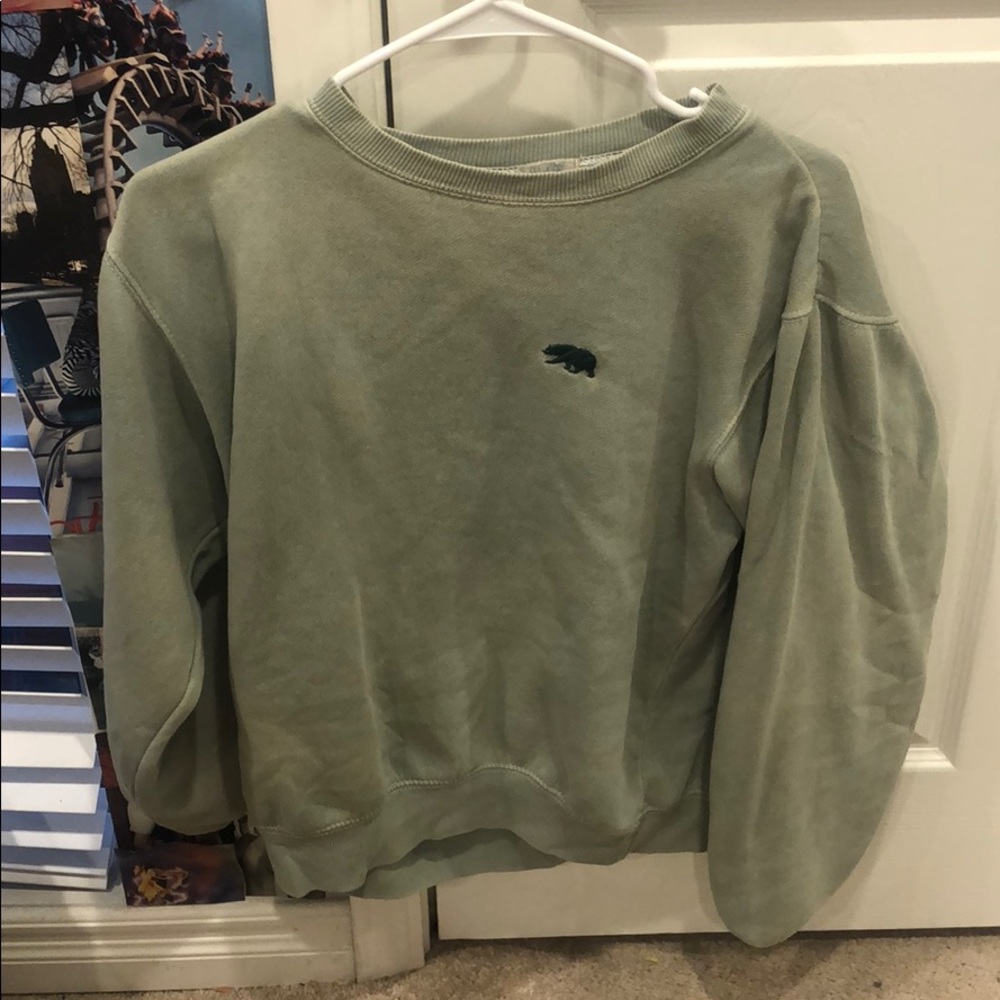green sweatshirt
